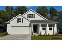 Charming single-Gathering home with a manicured lawn, neutral siding, and a convenient attached garage at 7100 Shooting Star Way, Myrtle Beach, SC 29579