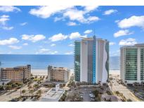 Stunning aerial view of Ocean One Resort on Myrtle Beach with amazing ocean views and crystal blue skies at 107 S Ocean Blvd. # 1001, Myrtle Beach, SC 29577