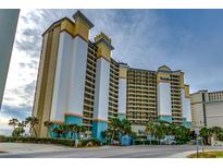 Stunning exterior view of an ocean front resort featuring multiple floors and private balconies at 4800 S Ocean Blvd. # 420, North Myrtle Beach, SC 29582
