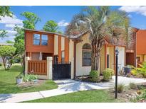 Charming two-story home with gated front courtyard and mature palm tree at 613 13Th Ave. S # 147, Surfside Beach, SC 29575