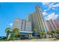 The Carolinian Beach Resort has beautiful architecture, landscaping, and great views of the blue sky and white clouds at 2404 N Ocean Blvd. # 635, Myrtle Beach, SC 29577