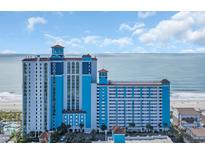 Beautiful beachfront condo with blue accents, multiple balconies, and stunning ocean views at 3000 N Ocean Blvd. # 220, Myrtle Beach, SC 29577