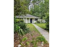 Charming single-story home with a well-maintained yard and a welcoming entrance at 6638 Greenslake Point, Myrtle Beach, SC 29588