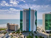 Striking high-rise building Oceans One in a beach community with beautiful ocean views at 107 S Ocean Blvd. # 1402, Myrtle Beach, SC 29577