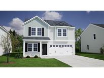 Charming two-story home featuring a two-car garage and a well-manicured lawn at 1101 Hainer Place Dr, Conway, SC 29526