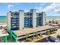 Beautiful beachfront condo building featuring private parking and a partial ocean view at 1709 S Ocean Blvd. # 403, North Myrtle Beach, SC 29582