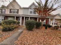 Charming townhomes feature inviting front porches and well-maintained landscaping at 238 Seabert Rd. # 238, Myrtle Beach, SC 29579