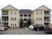 Attractive condo building with multiple units and well-maintained grounds in a convenient, accessible location at 2090 Cross Gate Blvd # 301, Myrtle Beach, SC 29575