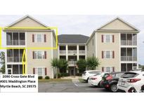 Inviting condo complex featuring screened porches and ample parking for convenient coastal living at 2090 Cross Gate Blvd # 301, Myrtle Beach, SC 29575