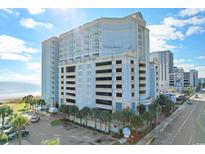 Beautiful view of the oceanfront Holiday Beach Resort condos and covered parking in Myrtle Beach, SC at 2501 S Ocean Blvd. # 831, Myrtle Beach, SC 29577