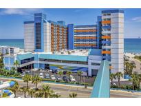 The Landmark Resort hotel exterior with vibrant blue and orange accents and ocean views at 1501 S Ocean Blvd. # 1250, Myrtle Beach, SC 29577