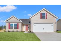 Charming single-Gathering home featuring a two-car garage, landscaped lawn, and inviting red door at 263 Stillbrook Dr., Longs, SC 29568