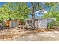 Charming exterior view of a beach home featuring a unique bar and inviting porch at 6001-N73 South Kings Hwy., Myrtle Beach, SC 29575
