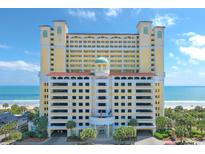 Stunning exterior view of the Camelot by the Sea resort on a sunny day near the beach at 2000 N Ocean Blvd. # 315, Myrtle Beach, SC 29577