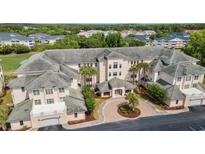Beautiful building with a circle drive and palm trees at 2180 Waterview Ln. # 836, North Myrtle Beach, SC 29582