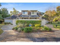 Charming two-story condo with well-manicured landscaping and private entrance at 306 Westbury Ct. # 2-B, Myrtle Beach, SC 29572