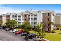 Beautiful condominiums featuring multiple stories and plenty of parking spaces at 4895 Luster Leaf Circle # 304, Myrtle Beach, SC 29577