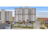 Spacious condo building offers parking and a beachside view for a relaxing getaway at 5800 N Ocean Blvd. # 405, North Myrtle Beach, SC 29582