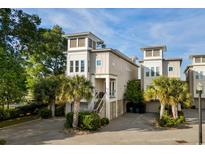 Charming coastal home with private entrance and manicured landscaping and beautiful architectural design at 600 48Th Ave. S # 201, North Myrtle Beach, SC 29582