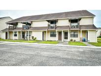 Two-story condo building featuring balconies, vinyl siding, and well-maintained green spaces at 755 Burcale Rd. # D6, Myrtle Beach, SC 29579