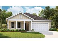 Charming single-story home featuring a two-car garage and a beautifully landscaped front yard at 3030 Palma Way, Myrtle Beach, SC 29579