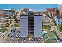 Holiday Towers exterior showcasing its prime oceanfront location and nearby amenities at 601 Mitchell Dr. # 806, Myrtle Beach, SC 29577