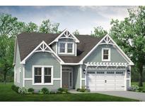 Charming home with light green siding, white trim, a two-car garage, and well-manicured front lawn at 732 St. Vincent Loop, Little River, SC 29566