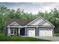 Charming blue single-story home featuring a two-car garage, complemented by lush landscaping and a well-manicured lawn at 1230 Halter Pl., Calabash, NC 28467