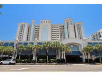 Beautiful condo exterior featuring palm trees, beach access and garage at 2311 South Ocean Blvd. # 559, Myrtle Beach, SC 29577