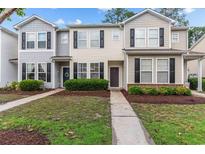 Charming townhome featuring neat landscaping and a welcoming entryway at 112 Olde Towne Way # 5, Myrtle Beach, SC 29588