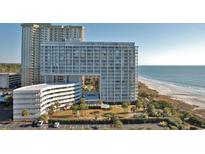 Stunning oceanfront condo building with a pool, beach access, and ample parking at 9840 Queensway Blvd. # 329, Myrtle Beach, SC 29572