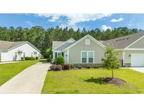 Charming home with a well-manicured lawn, attractive landscaping, and inviting curb appeal at 779 Salerno Circle # A, Myrtle Beach, SC 29579