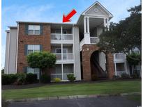 Condominium complex with tan siding, brick accents, and private balconies at 3761 Citation Way # 531, Myrtle Beach, SC 29577
