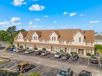 Spacious townhouse complex with ample parking and well-maintained landscaping, perfect for comfortable living at 510 Fairwood Lakes Dr. # 19-Q, Myrtle Beach, SC 29588