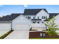 Charming townhome featuring an attached garage, sidewalk and lawn at 5310 Knobcone Loop # B, Myrtle Beach, SC 29577