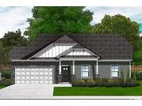 Charming home with stone accents, covered porch, and lush green lawn at 977 Oak Hollow St., Longs, SC 29568