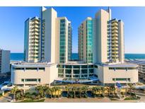 A vista of a luxury beach resort featuring modern architecture and ocean views at 304 N Ocean Blvd. # 1113, North Myrtle Beach, SC 29582