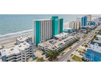 Expansive oceanfront condo complex with ample parking and coastal views at 1210 N Waccamaw Dr. # 1105, Murrells Inlet, SC 29576