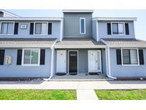 Charming townhouse exterior with a tidy, landscaped yard and a welcoming facade at 1890 Colony Dr. # 18-C, Surfside Beach, SC 29575
