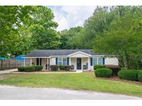 Charming single-story home with well-maintained lawn and inviting landscaping at 2510 Redwood St., Georgetown, SC 29440