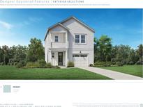 Charming two-story home featuring a covered porch, inviting entrance, and a well-manicured lawn at 2616 Hillbourne Loop, North Myrtle Beach, SC 29582