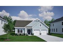 Charming single-Gathering home with a two-car garage, stone accents, and manicured lawn on a sunny day at 1079 Laconic Dr., Myrtle Beach, SC 29588