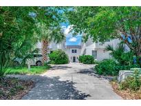 Exterior of a charming townhouse with lush landscaping and driveway at 2309 Withers Dr. # 7, Myrtle Beach, SC 29577