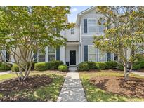 Charming townhome featuring a landscaped front yard and welcoming entryway at 314 Kiskadee Loop # 8-C, Conway, SC 29526