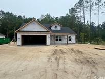 New construction single-Gathering home with an attached two car garage at 142 Temple Dr., Aynor, SC 29511