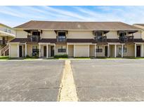 Straight-on view of a two-story townhouse with balconies at 755 Burcale Rd. # E-3, Myrtle Beach, SC 29579