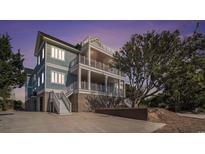 Beautiful coastal home with multiple decks and stunning architectural design features at 139 Pioneer Loop, Georgetown, SC 29440