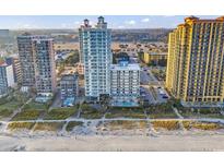 Beautiful aerial view of a beachside condo complex with pools and sandy beach access at 2504 N Ocean Blvd. # 2030, Myrtle Beach, SC 29577
