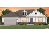 Charming single Gathering home featuring a two-car garage and manicured lawn at 9419 Long Meadow Way, Longs, SC 29568