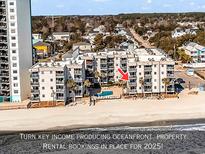 Oceanfront condo complex offering beach access and resort-style amenities at 1310 N Waccamaw Dr. # 208, Garden City Beach, SC 29576